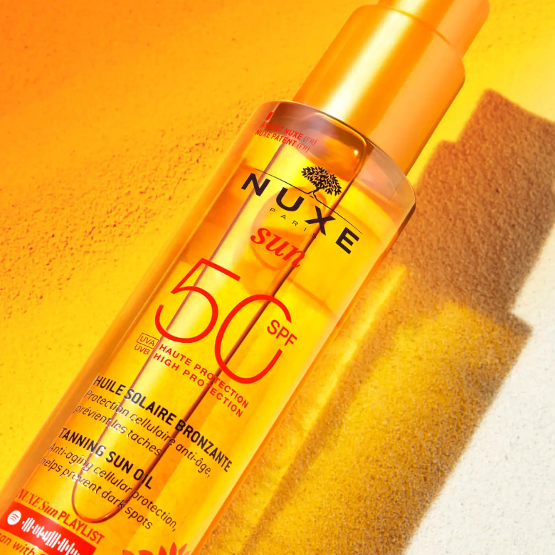 NUXE Cosmética de Origen natural Aceite Bronceador Alta Protección SPF50 rostro y cuerpo, NUXE Sun 150ml Protección celular antiedad, previene las manchas.
